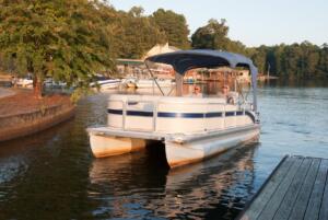 pontoon boat at sunset what boat type is best for you