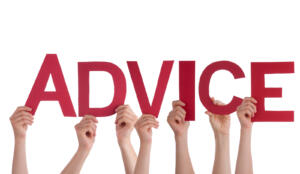 hands holding up the word "advice"