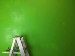 green wall with ladder