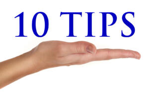 hand holding the words "10 bathroom tips"