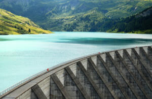 dam stopping turquoise blue water
