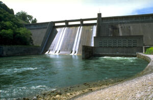Norris Dam with water coming through 