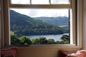 looking out at the lake through window