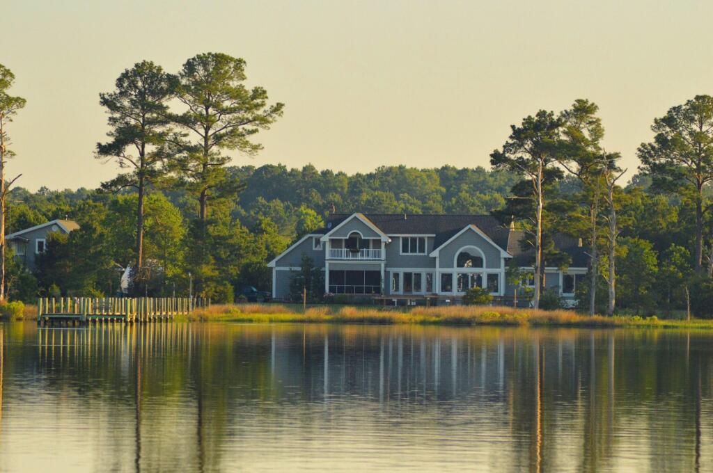 Lake house on serene water