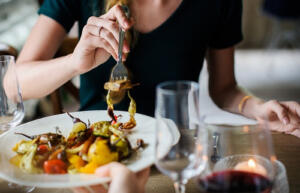 woman eating a fancy meal