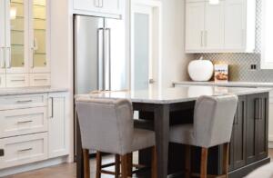 kitchen with white walls, stainless appliances