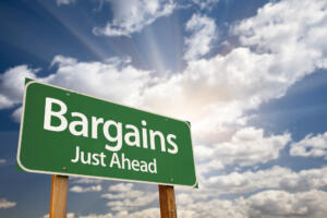 when to buy a lake home, bargains street sign