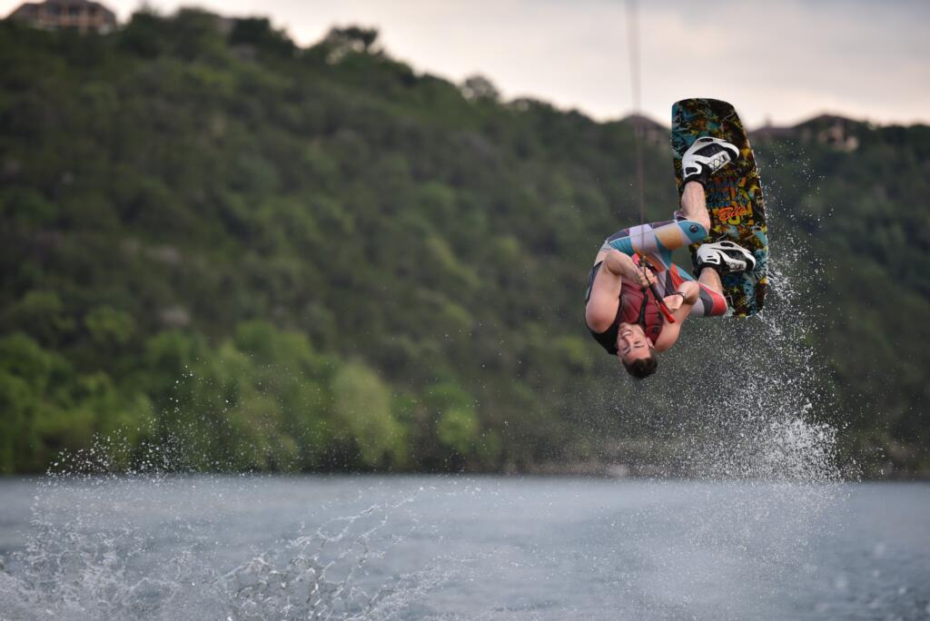 male wakeboarder in the air on Texas' Lake Austin