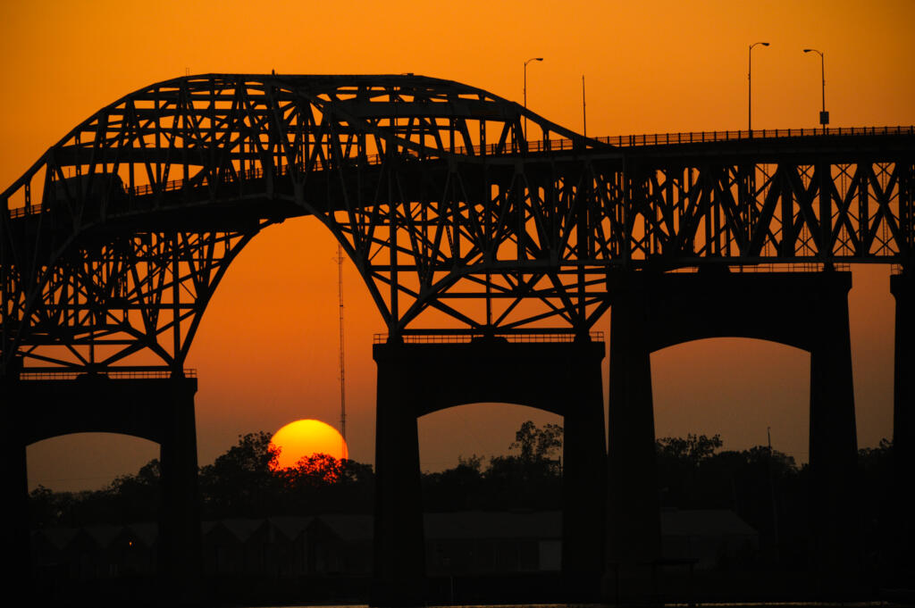 Sun setting over Interstate 10 Bridge Lake Charles Louisiana