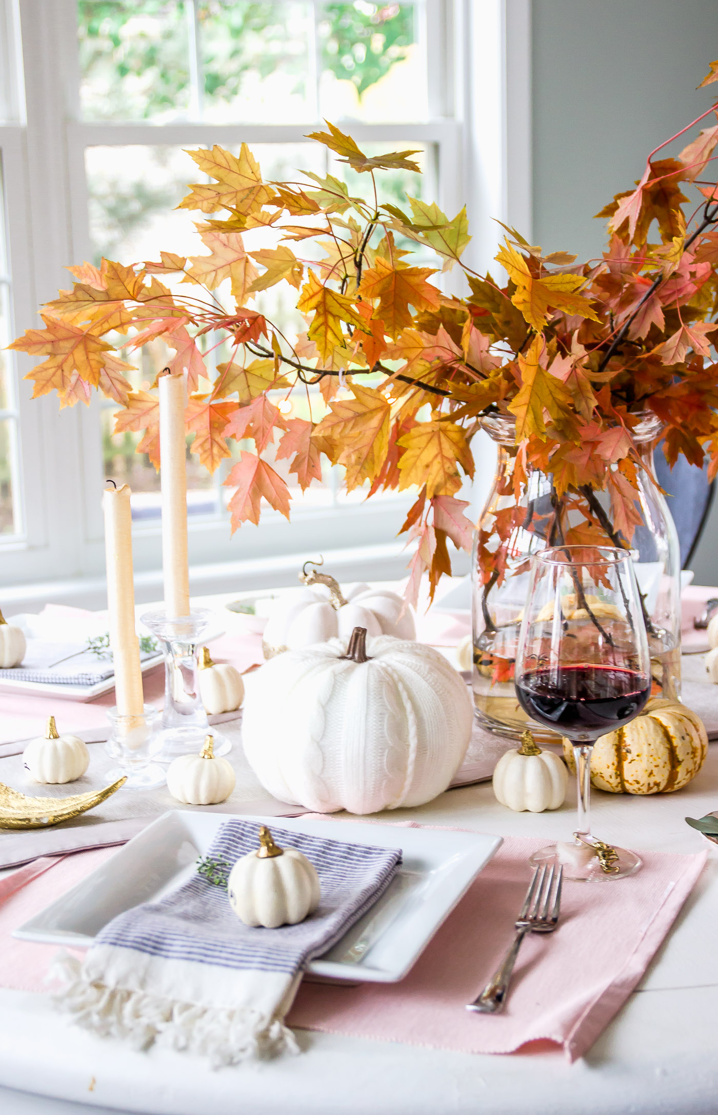 Autumn fall seasonal tablescape with white and gold pumpkins
