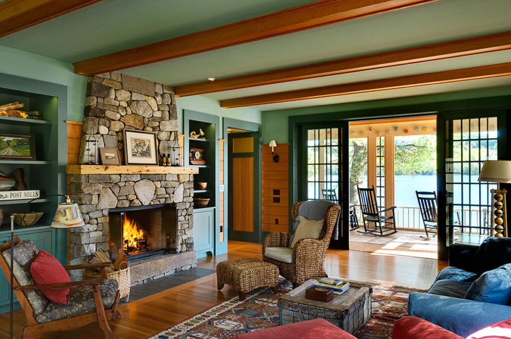 Smith and Vasant Architecture lake house in Vermont with green paint and view of the lake interior design trend