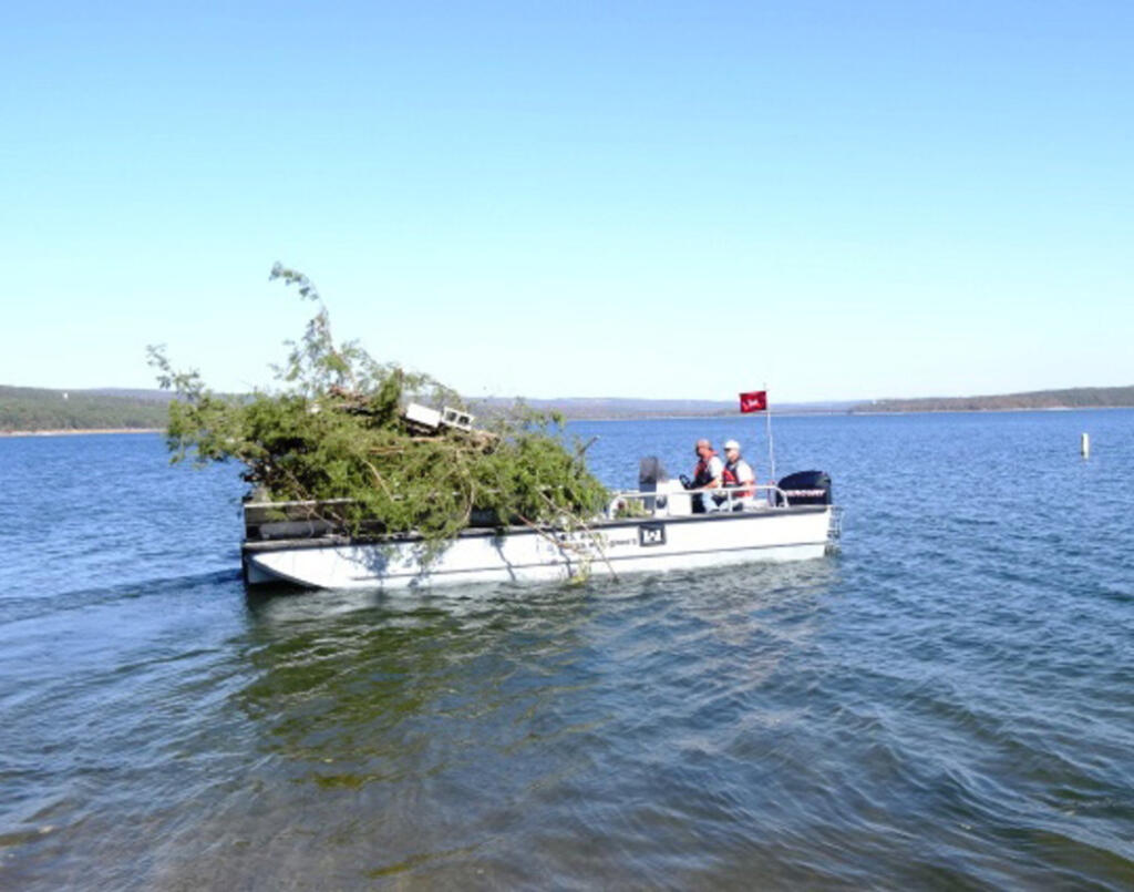 United States Army Corps of Engineering creating a fish habitat out of trees