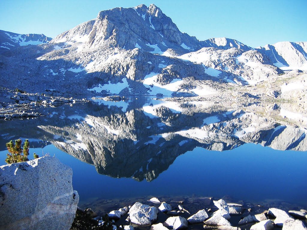 mirror reflection of muriel lake during winter