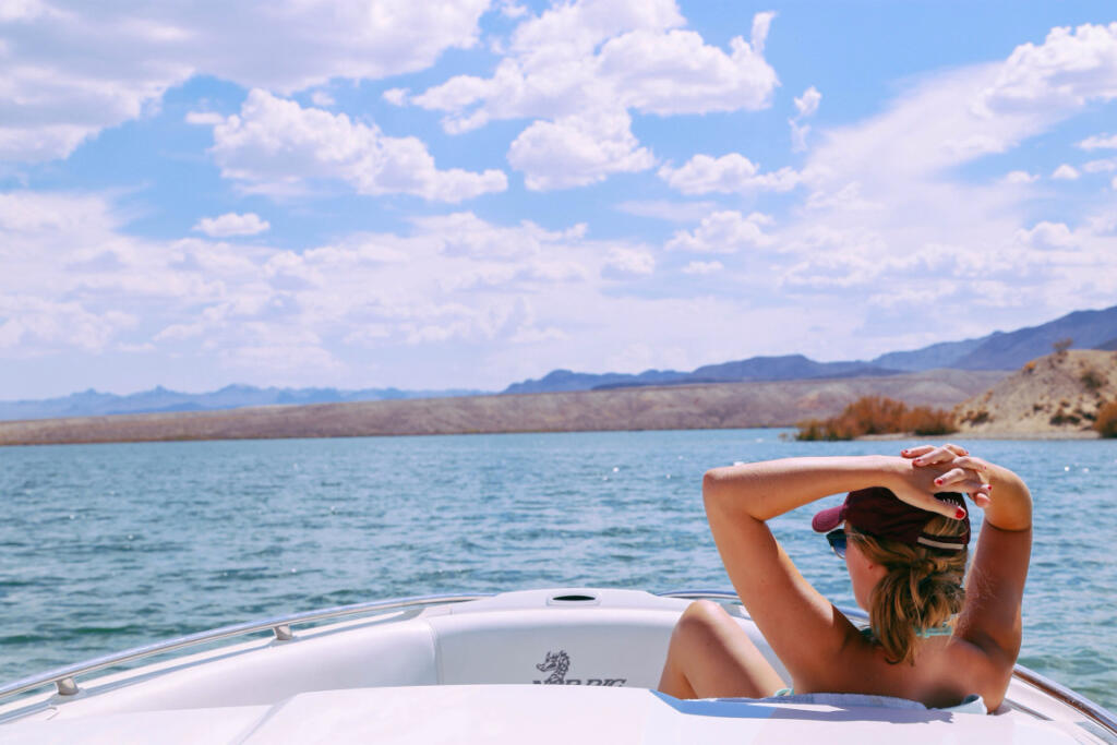 Woman relaxing on boat enjoying the view