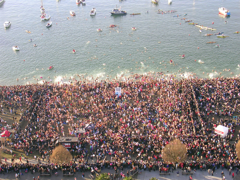 massive crowd at Annual polar bear swim in Vancouver, Canada 