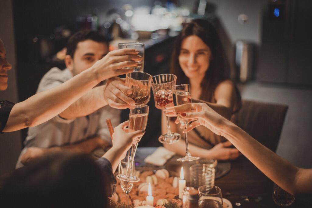 Friends and family toasting at dinner party