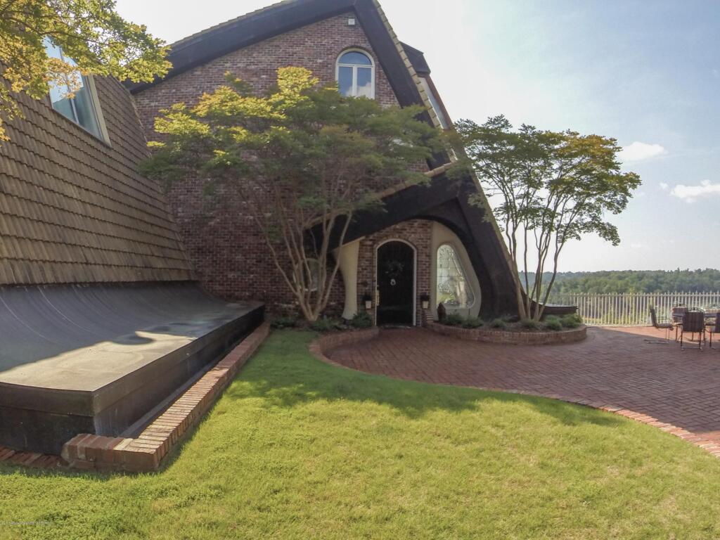 Storybook architecture on dream home on Lewis Smith Lake, Alabama