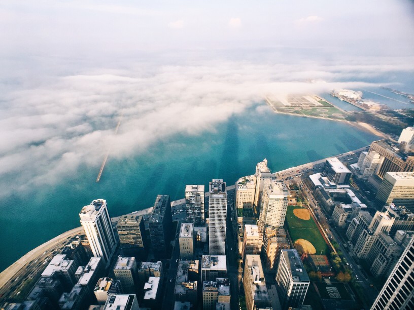 Aerial view with clouds over city