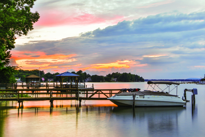 boat at dock during sunset