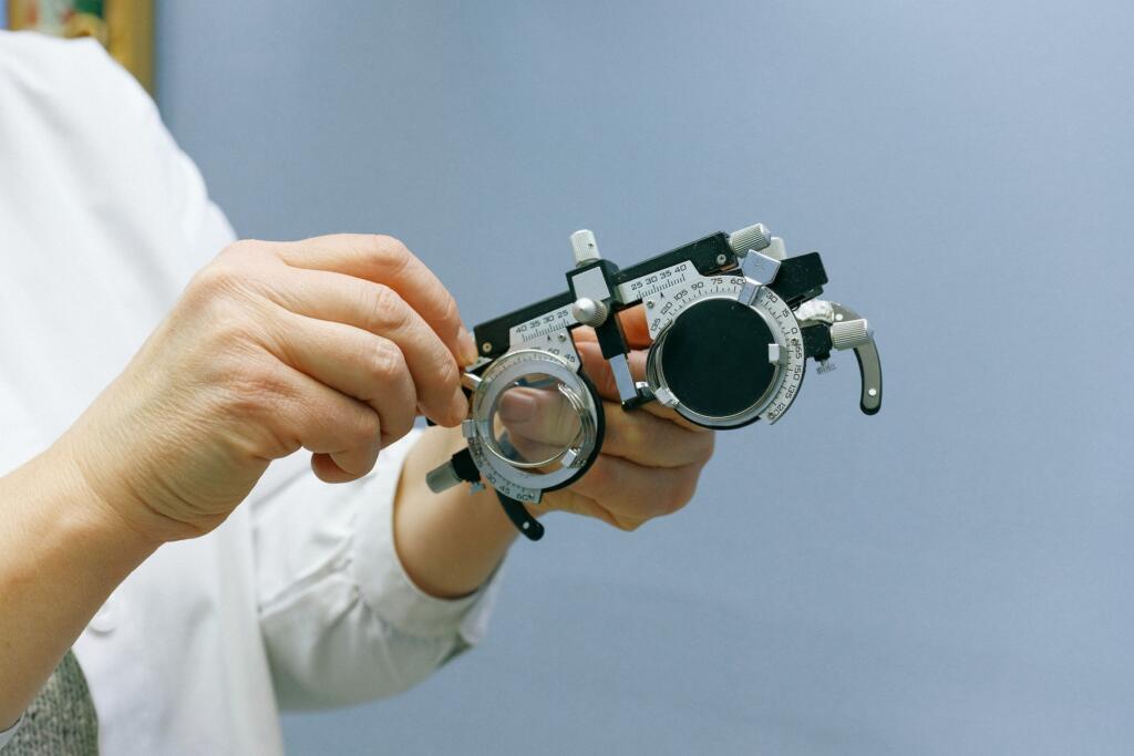 person adjusting medical tool