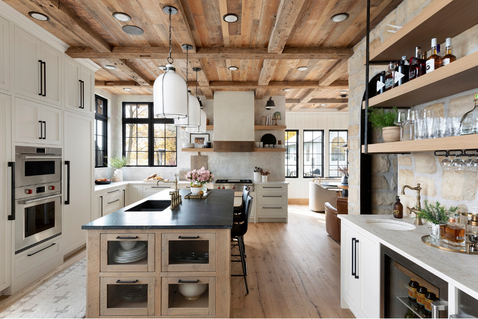 Rustic lake home kitchen design with reclaimed woods, stone, soapstone, and modern furnishings