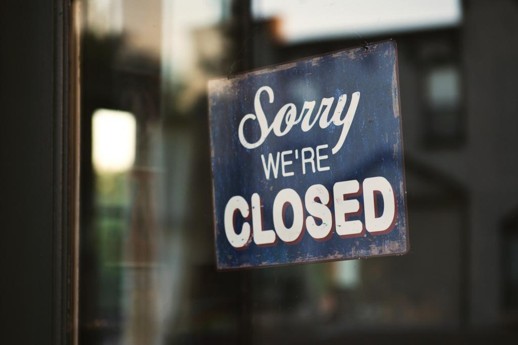 Shop with a closed sign.