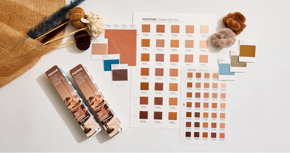 Pantone 17-1230 Mocha Mousse stylized palette shot with paint colors, fabric swatches, textiles, textures, paint decks