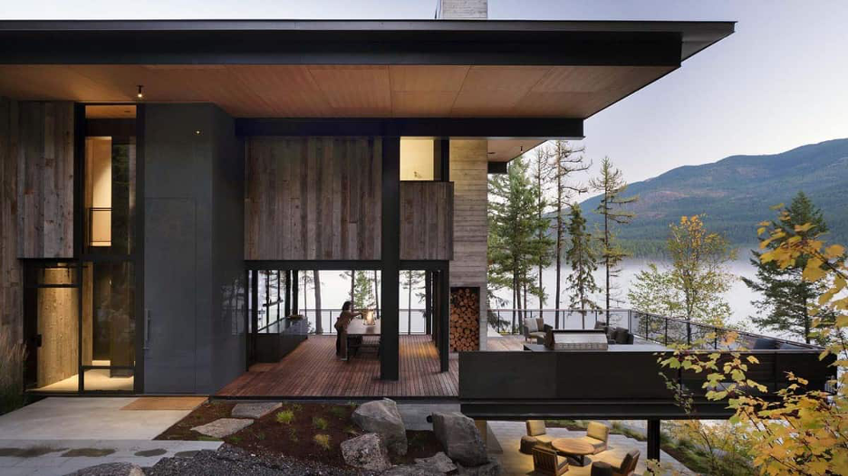 Biophilic design and organic textures demonstrated in the architecture and materials of this mountain lake home with expansive outdoor deck